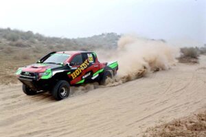 A racer showcases his skills in the final round of the 9th Thal Desert Jeep Rally organized by the Tourism Development Corporation of Punjab
