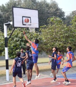 Players in action in semi-final basketball match played between Punjab College and Divisional Public School & College teams during Inter-Collegiate Basketball & Handball Championship 2024-25 at Sandal School and College Ground.