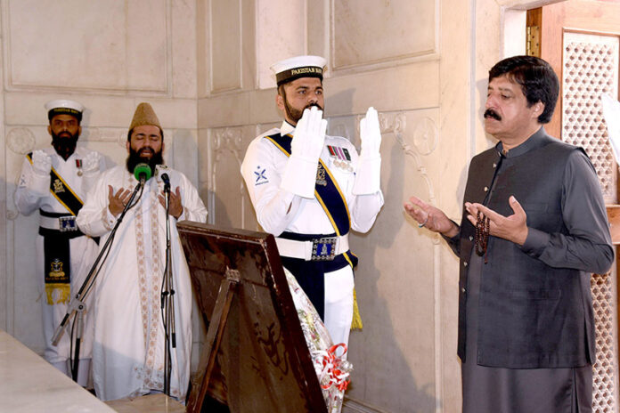 Governor Punjab Sardar Saleem Haider Khan offering Fateha after laying floral wreath during change of guard ceremony to pay homage to Allama Muhammad Iqbal on his 147 birth anniversary at Mazar-e-Iqbal
