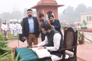 Federal Minister for Information and Broadcasting Attaullah Tarar records his remarks after offering Fateha and laying floral wreath at Mazar-e- Allama Muhammad Iqbal on his 147 birth anniversary