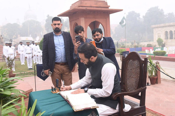 Federal Minister for Information and Broadcasting Attaullah Tarar records his remarks after offering Fateha and laying floral wreath at Mazar-e- Allama Muhammad Iqbal on his 147 birth anniversary