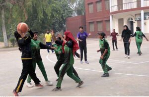 Players in action during the intense basketball match between Govt Post Graduate College Chandni Chowk and Redor College Sargodha, part of the Intercollegiate Basketball Tournament organized by the Sargodha Education Board at Govt College Chandni Chowk