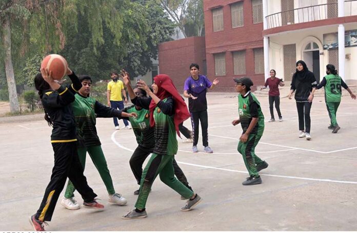 Players in action during the intense basketball match between Govt Post Graduate College Chandni Chowk and Redor College Sargodha, part of the Intercollegiate Basketball Tournament organized by the Sargodha Education Board at Govt College Chandni Chowk