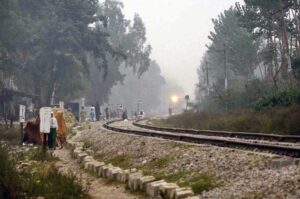 People sitting on rail track while a train approaching on the track may cause any mishap and needs the attention of concerned authorities.
