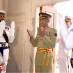 GOC Rao Imran Sartaj Major General offering Fateha after laying floral wreath during change of guard ceremony to pay homage to Allama Muhammad Iqbal on his 147 birth anniversary at Mazar-e-Iqbal