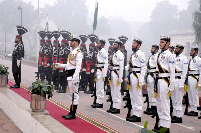 Pakistan Navy and Pakistan Rangers performing at change of guard ceremony to pay homage to Allama Muhammad Iqbal on his 147 birth anniversary at Mazar-e-Iqbal