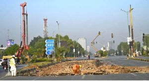 A development project is underway as heavy machinery is being used in the construction work at the PTCL Chowk Underpass, aimed at improving traffic flow and infrastructure in the heart of the Federal Capital.