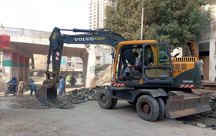 Heavy machinery being used to Development Work in Gulshan -e-Iqbal 13-D Area in Provincial Capital City