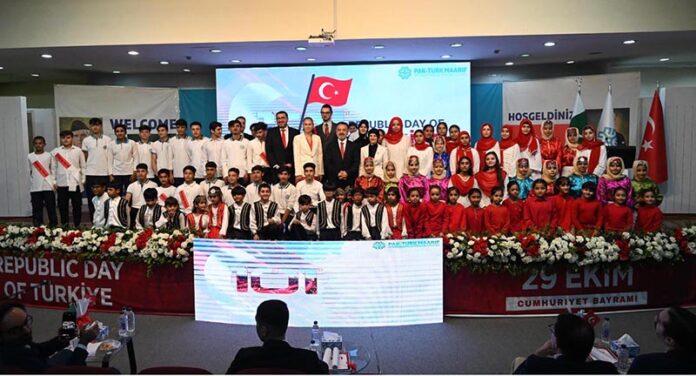 Turkish Ambassador to Pakistan Irfan Neziroglu in a group photograph with Students during 