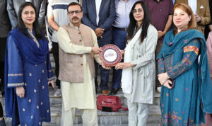 The students of Quaid-i-Azam University's Department of Defence & Strategic Studies in a group photograph with Managing Director APP Muhammad Asim Khichi, during their visit to the news agency's headquarters.