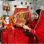 Pakistani hindu community performing religious rituals during Dewali festival at Krishna Mandir in lahore