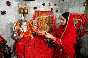 Pakistani hindu community performing religious rituals during Dewali festival at Krishna Mandir in lahore