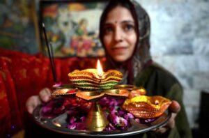 Pakistani hindu community performing religious rituals during Dewali festival at Krishna Mandir in lahore