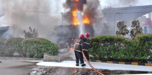 Rescue workers are actively battling the blaze to prevent further damage after an oil tanker caught fire near Thatha Bridge on Canal Road.