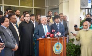 Federal Minister for Industries and Production Rana Taveer Hussain is addressing an unveiling exhibition ceremony of models of electric bikes at Engineering Development Board.