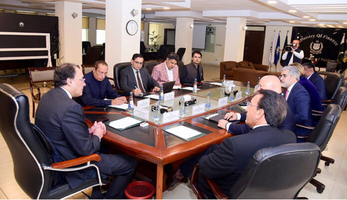Federal Minister for Finance and Revenue, Senator Muhammad Aurangzeb, in a meeting with a VEON Group delegation, led by Founder and Chairman of the Board of VEON Group, Augie K. Fabela, at the Finance Division