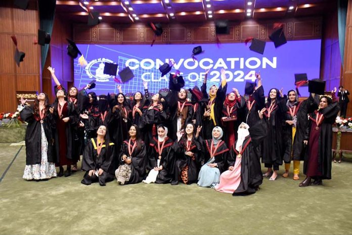 Students celebrate in the traditional way by throwing caps in the air after Convocation 2024 at Capital University of Science and Technology (CUST)