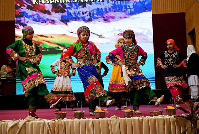 Students performing a Kashmir song and dance during the opening ceremony of 