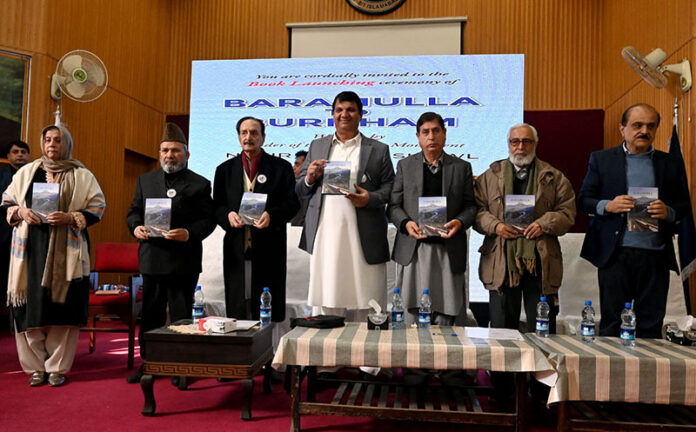 Federal Minister for States and Frontier Regions (SAFRON) Kashmir Affairs and Gilgit Baltistan, Engineer Amir Muqam, Federal Secretary for Education and Professional Training Mohyuddin Ahmed Wani and Senior Politician (PML-N) Raja Zafar ul Haq during book launching ceremony at 