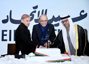 President Asif Ali Zardari, Prime Minister Muhammad Shehbaz Sharif and Ambassador of the United Arab Emirates to Pakistan Hamad Obaid Ibrahim Salem Al-Zaabi cutting cake to mark the National Day of the United Arab Emirates
