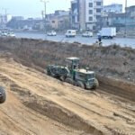 Heavy machinery being used for the construction of IJP Service Road in the Federal Capital