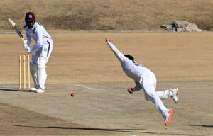 West Indies batter Mikyle Louis prepares for a powerful shot in response to Pakistan's strong bowling during the first Test match at Islamabad Club in federal capital.