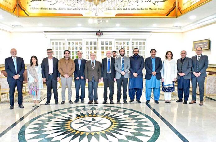Prime Minister Muhammad Shehbaz Sharif in a group photo with a delegation of Pakistan Broadcasters' Association