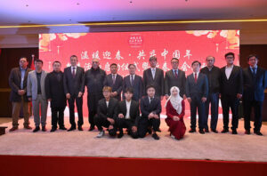 Ambassador of China to Pakistan, Jiang Zaidong in a group photograph with participants during an event regarding Chinese New Year