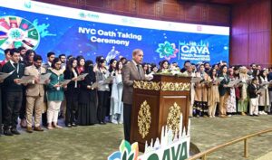 Prime Minister Muhammad Shehbaz Sharif administering oath to members of National Youth Council (NYC) at the inaugural session of the Commonwealth Asia Youth Alliance summit.