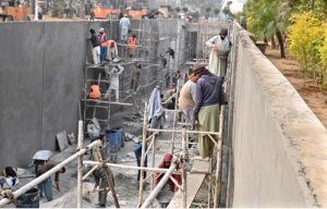 Laboures busy in construction work of Serena Chowk Interchange Project during development work in the Federal Capital.