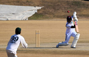 West Indies batter Mikyle Louis prepares for a powerful shot in response to Pakistan's strong bowling during the first Test match at Islamabad Club in federal capital.
