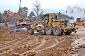 Labourers busy in construction work of Serena Chowk Interchange Project during development work in the Federal Capital