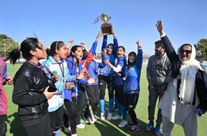 Winning players of Lahore board hockey team lifting trophy after hockey match between Mardan and Lahore Boards the Inter-Board Girls Gala organized by the Federal Board of Intermediate and Secondary Education at Naseer Bunda Hockey Stadium Pakistan Sports Board.