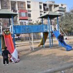 Youngsters enjoy slides at local park in the Federal Capital