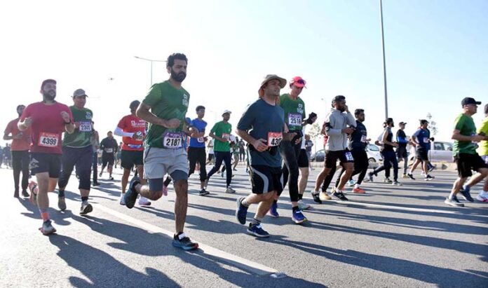 A large number of people participating in Islamabad Marathon 2025 organized by “Islamabad Run with Us”