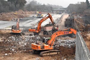 Laboures busy in construction work of Serena Chowk Interchange Project during development work in the Federal Capital.