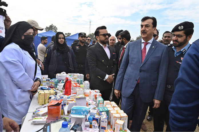 Chairman Senate of Pakistan, Syed Yousaf Raza Gillani visiting stalls at opening ceremony of health & Fitness Gala at Police Lines