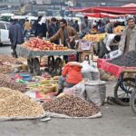 Vendors displaying dry fruits to attract the customers at Pirwadhai