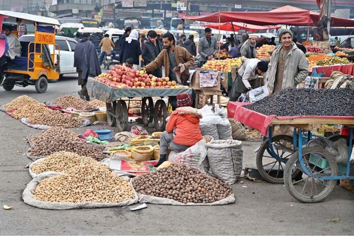 Vendors displaying dry fruits to attract the customers at Pirwadhai