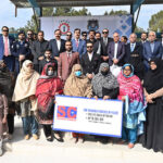 Chairman Senate of Pakistan, Syed Yousaf Raza Gillani in a group photograph with other participants during the opening ceremony of health & Fitness Gala at Police Lines
