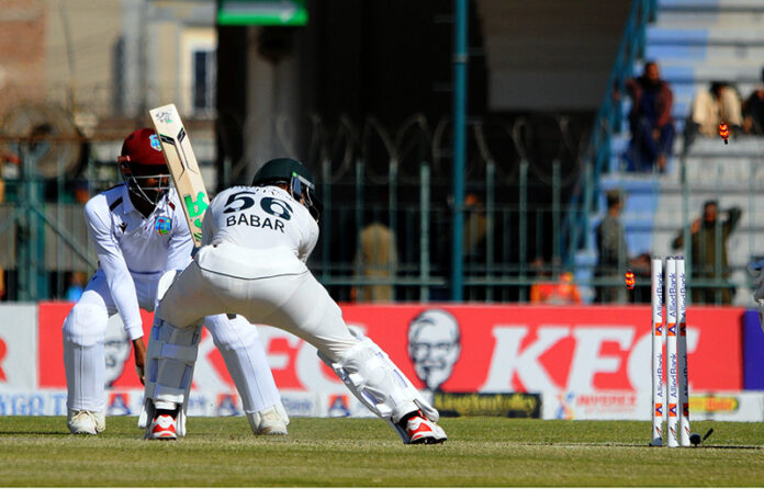 Pakistan's Babar Azam clean bowled by West Indies' Gudakesh Motie during the first day of the second Test cricket match between Pakistan and West Indies at the Multan Cricket Stadium
