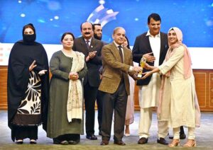 Prime Minister Muhammad Shehbaz Sharif giving away awards to high achievers at the inaugural session of the Commonwealth Asia Youth Alliance summit.