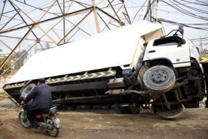A road accident at Amar Sadhu as a truck overturns, causing damage and disrupting traffic in the provincial capital