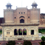 A magnificent view of the Alamgiri Gate in the historic Shahi Fort of Lahore, a testament to Mughal grandeur. Originally built by Emperor Akbar, it stands alongside Shalamar Bagh as a UNESCO World Heritage Site