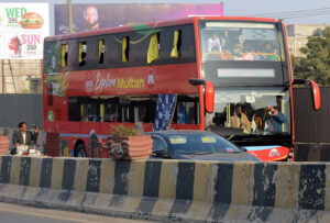 People are traveling for tourism on a new hybrid double-decker bus run in the city.