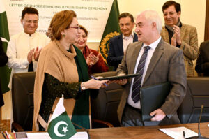 Coordinator to PM for Climate Change, Romina Khurshid Alam witnessing signing ceremony of Letter of Understanding (LoU) as Secretary MoCC, Aisha Humera Moriani and CEO of AKF in Pakistan Akhtar Iqbal are signing LoU.