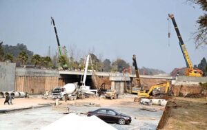 Labourers busy in construction work of Serena Chowk Interchange Project during development work in Federal Capital.