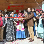 Postmaster General of Northern Sindh DR. Najeed-ur-Rehman cutting ribbon at the inauguration ceremony of Women Post Office in Defense Area