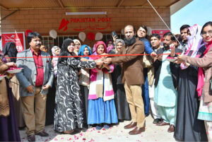 Postmaster General of Northern Sindh DR. Najeed-ur-Rehman cutting ribbon at the inauguration ceremony of Women Post Office in Defense Area