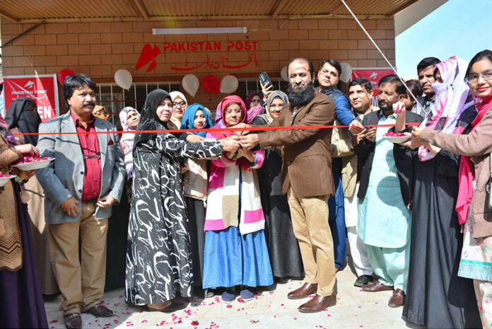 Postmaster General of Northern Sindh DR. Najeed-ur-Rehman cutting ribbon at the inauguration ceremony of Women Post Office in Defense Area